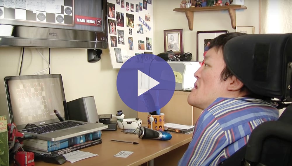 Video about Jared, born with cerebral palsy, who uses a “sip and puff” switch to use the computer.